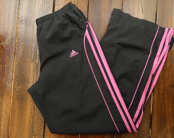 black adidas pants with pink stripes