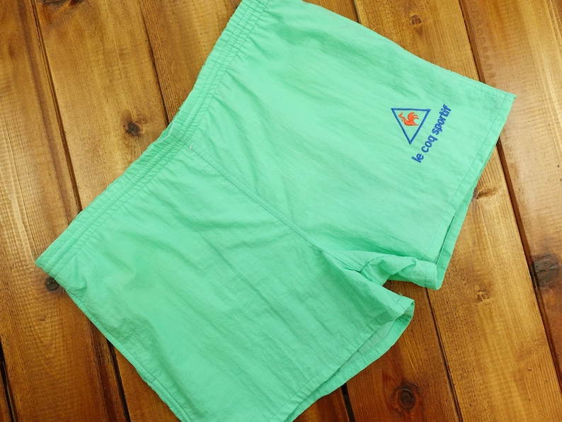 Vintage Le Coq Sportif Mesh Lined Swim Trunks Size Small Z10