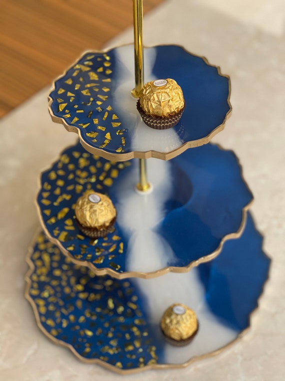 Working on a 3 tier resin heart tray with gold flakes 