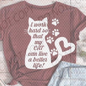May include: A maroon t-shirt with a white silhouette of a cat and the text "I work hard so that my CAT can live a better life!"