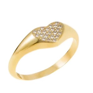 May include: A gold ring with a heart-shaped design set with small clear stones.