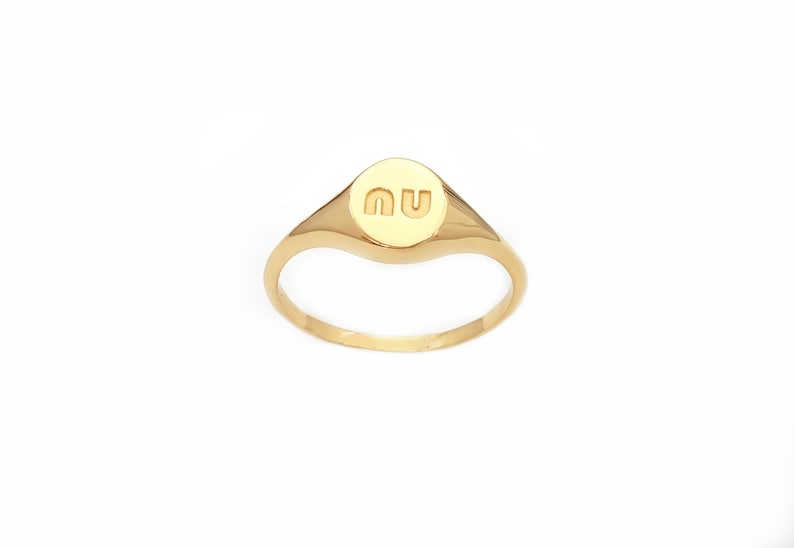 Dainty round signet ring made of solid gold