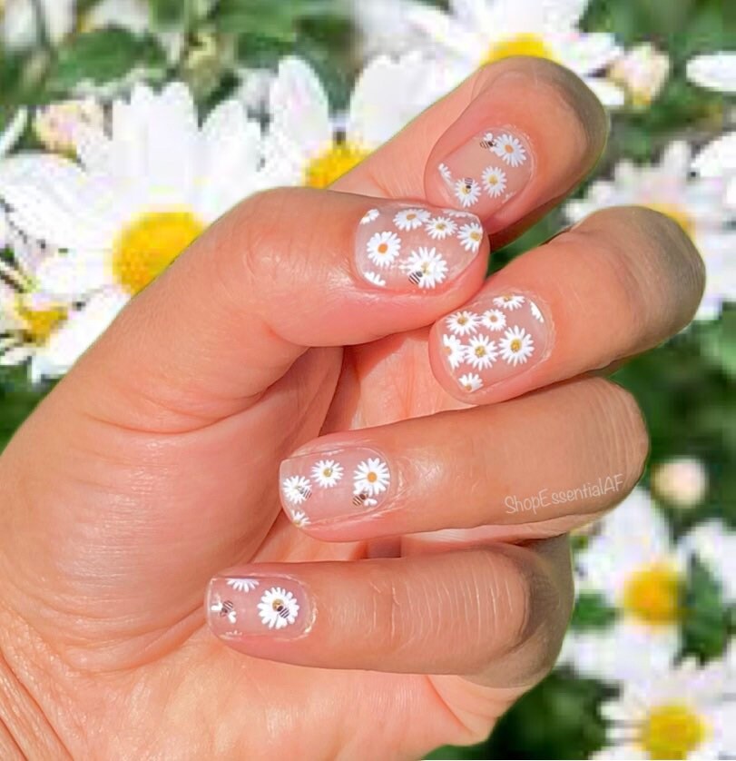 30 Best Black Nail Designs For 2022 : White Daisy Black Nail Design