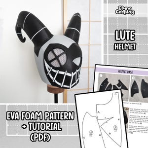 Könnte beinhalten: Ein schwarz-grauer Lute-Helm mit weißen Akzenten, der ein stilisiertes Grinsen und Hörner aufweist. Das Bild enthält ein Muster und ein Tutorial zur Herstellung des Helms, mit dem Text "EVA FOAM PATTERN + TUTORIAL (PDF)" und "LUTE HELMET".