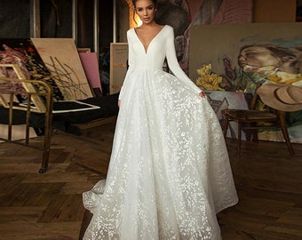 white lace wedding dress with sleeves