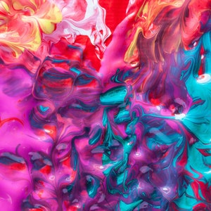May include: Abstract painting with swirling colors of pink, red, yellow, blue, and teal. The colors are blended together in a fluid and dynamic way, creating a sense of movement and energy. The painting is signed "S&K Designs 2020" in the bottom right corner.