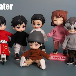 May include: A group of anime-style dolls wearing sweaters. The dolls are in various colors, including red, black, brown, pink, and gray. One doll is sitting on a red scooter. The word "sweater" is in the top left corner.