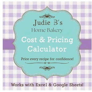May include: A teal and brown sign with the text "Judie B's Home Bakery Cost & Pricing Calculator". The sign is on a purple and white checkered background. The text "Price every recipe for confidence!" is also included.
