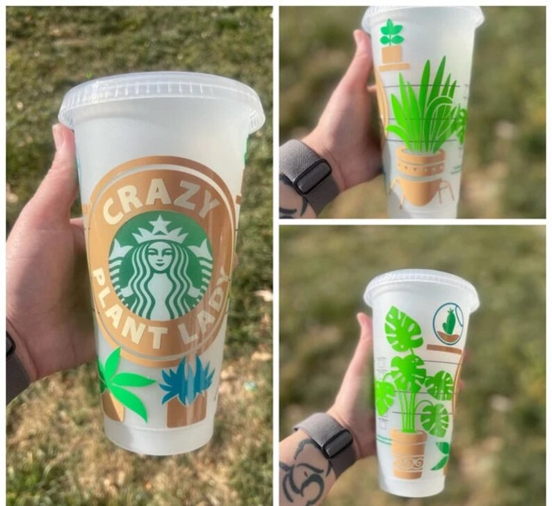 May include: A white reusable cup with a gold and green design. The cup has the text "Crazy Plant Lady" on it. The design includes a green plant with a brown pot and a green leaf.