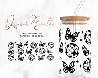 May include: A clear glass tumbler with a wooden lid and a straw. The tumbler is decorated with a pattern of black disco balls and butterflies. The text "Disco Balls" is written in cursive at the top of the image. The text "SVG/PNG/DXF for Glass Can 16 oz 20 oz." is written below the image of the tumbler.
