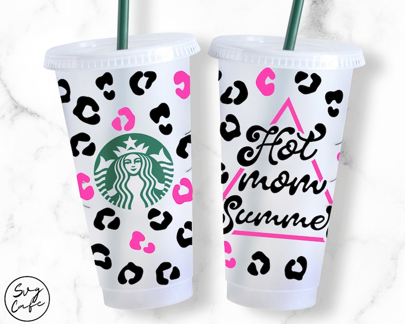 May include: Two white reusable cups with black and pink leopard print designs. One cup has the text "Hot Mom Summer" in a pink triangle.