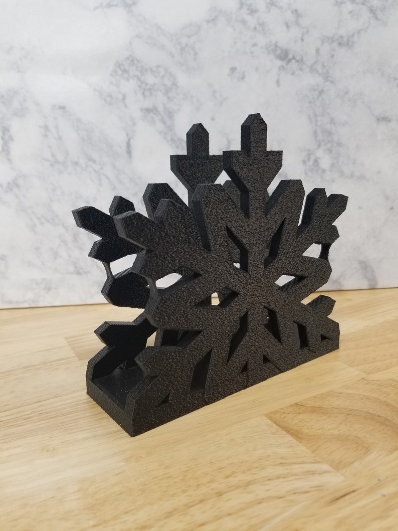 Napkin holder snowflake shape gold