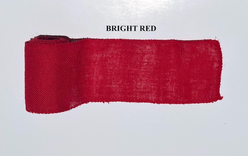 A BRIGHT RED BURLAP ROLL