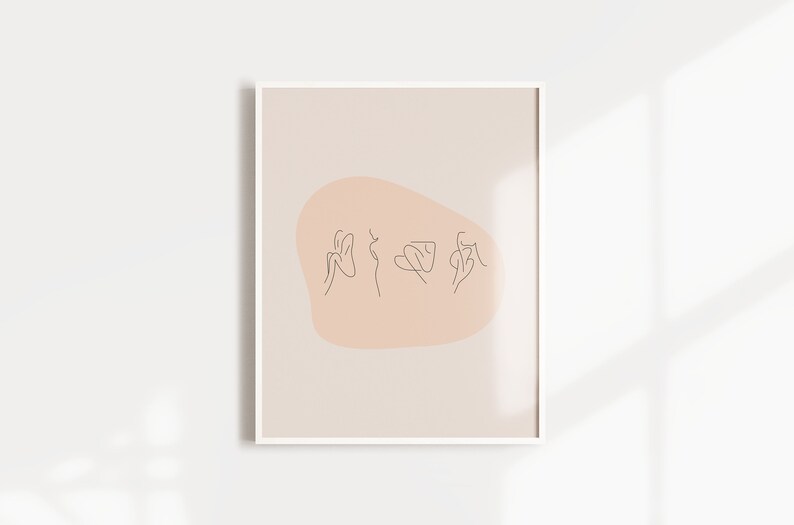 May include: A minimalist line art print featuring three figures in a continuous line, set against a peach-coloured background. The figures are stylised and abstract, with a focus on their form and movement.