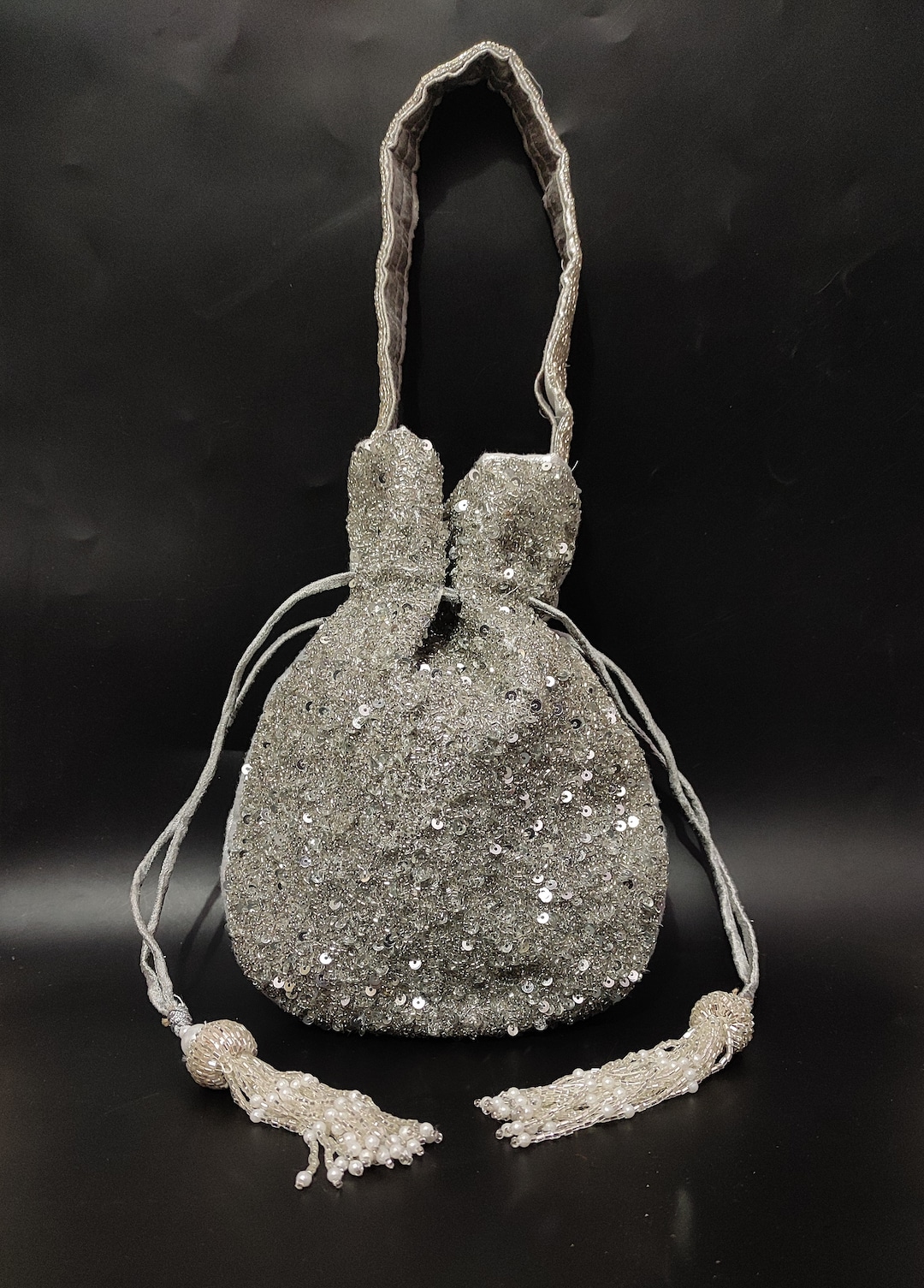Silver drawstring evening bag sale