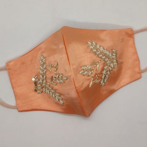 Costume Designer Leaf Texture Golden Sequin White Motif Embroidered Embellishment Face Mask Peach
