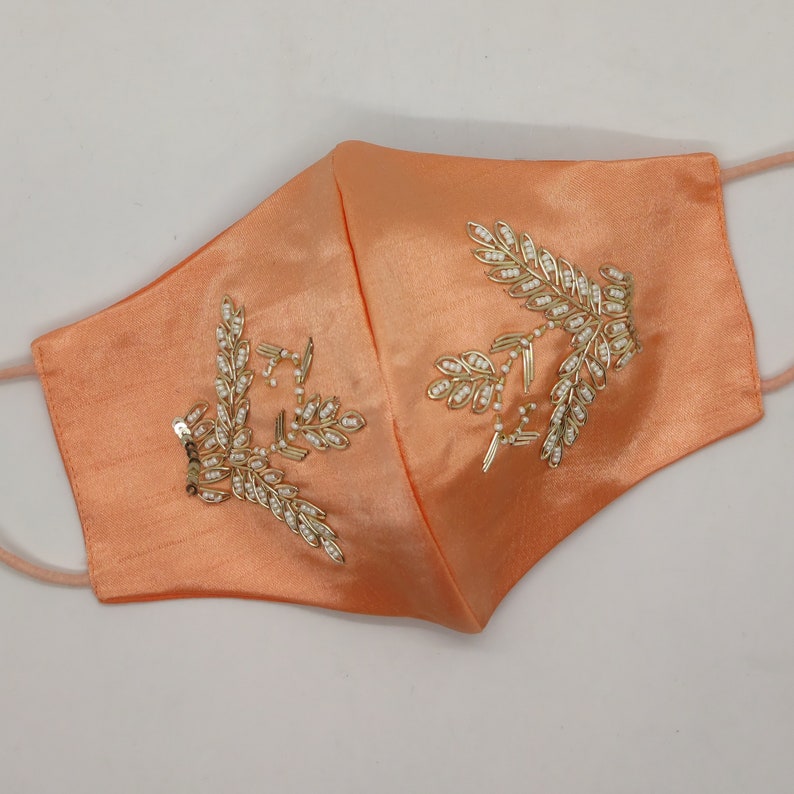 Costume Designer Leaf Texture Golden Sequin White Motif Embroidered Embellishment Face Mask Peach