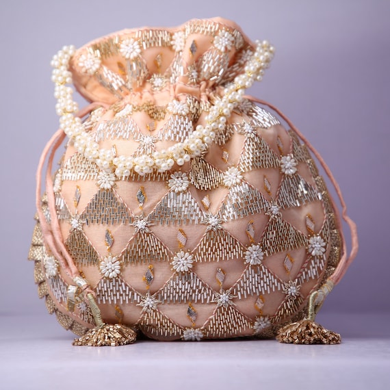 Indian Wedding Clutch Photos and Images & Pictures | Shutterstock