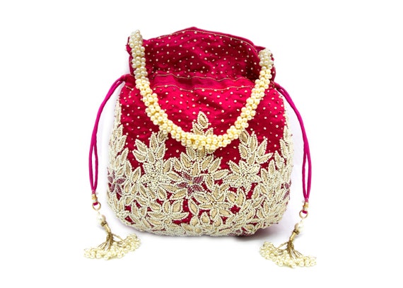 Flipkart.com | Rubans Cream Coloured Potli Handbag With Silver Embroidery  And Pearls Sling Bag - Sling Bag