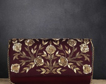 wine colored clutch