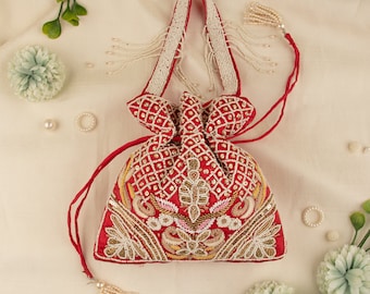 Bolsa potli de seda con bordado floral: monedero para recuerdo de boda indio