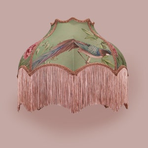 Jade Chinoiserie lampshade  decorated with matching fringe and trim