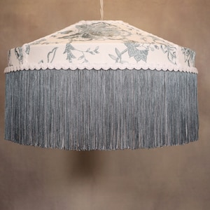 Embroidered linen lampshade in Duck egg. Made to order. Handmade covered with embroidered fabric, decorated with matching trim and fringes.