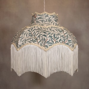 William Morris  lampshade decorated with matching fringe and trim