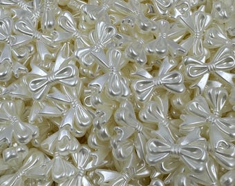 25 bowknot beads