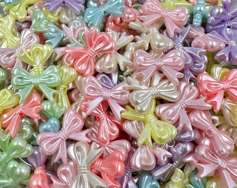 25 bowknot beads