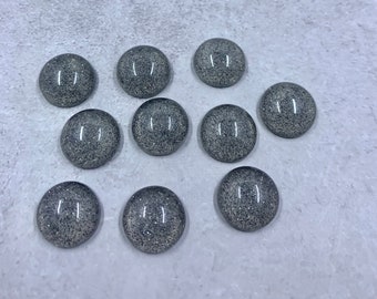 10 clear with black glitter flat back 12mm cabochons
