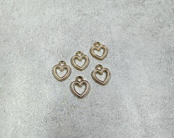 5 pink and gold heart charms