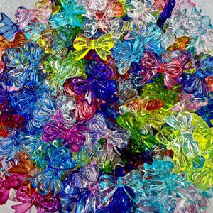 10 transparent bowknot beads
