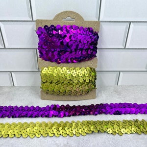 2 total yards of purple  and green sequin stretch elastic trim