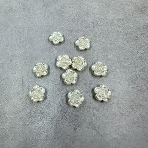 10 tiny rose cabochons