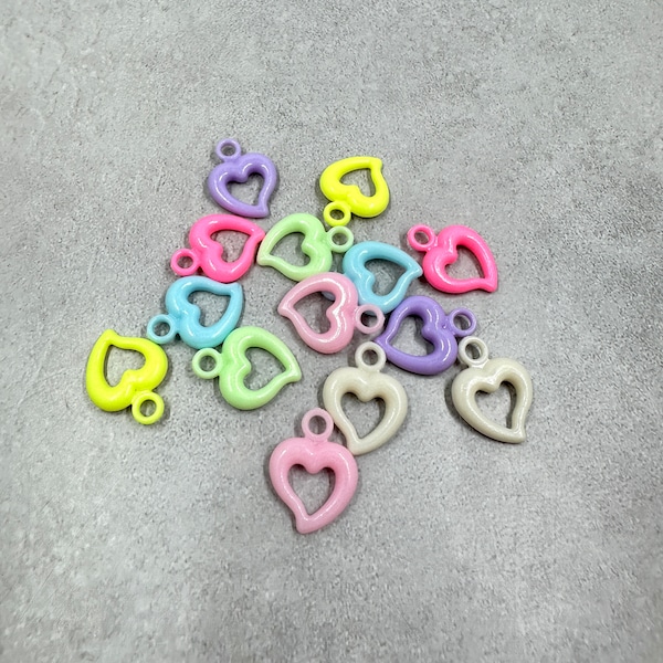 14 plastic acrylic heart charm pendants.