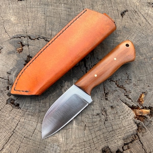 Handmade Bushcraft/Camp Knife with Leather Sheath—3/16” 1095 carbon steel—3.5” blade—4.5” Cumaru Wood handle—brass pins/lanyard tube