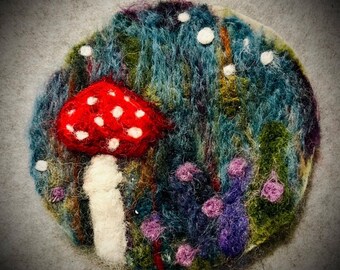 2D Needle felted mushroom art on a natural wood slice