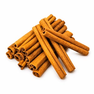 May include: A pile of dried cinnamon sticks with a light brown, woody texture. Each stick is formed by tightly rolled layers of bark, creating a hollow, cylindrical shape with visible spiral patterns at the open ends.