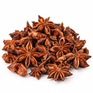 May include: A pile of dried star anise pods, each featuring a distinct eight-pointed star shape with a woody, reddish-brown texture. The pods are arranged in a cluster, showcasing the symmetrical seed-filled carpels of the spice.