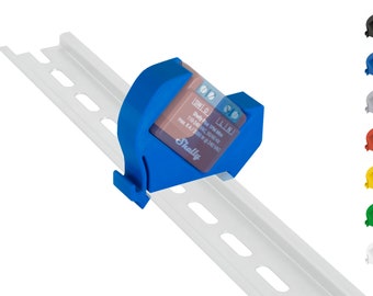 May include: Blue DIN rail mount for Shelly Plus 1PM mini smart home device. The device is labelled "Shelly Plus 1PM Mini 110/240 VAC 50/60Hz Max. 8.4 A 2.0 kW 240 VAC".