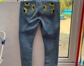 Hand painted sunflower jeans