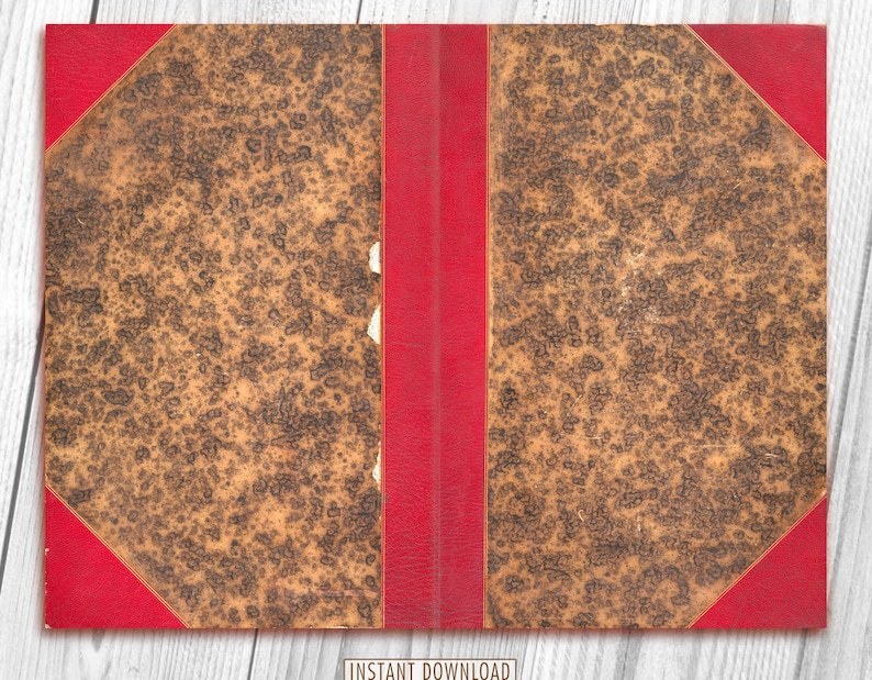 May include: A vintage book with a brown leather cover and red edges. The cover is worn and has a mottled pattern.