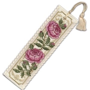 May include: Embroidered bookmark featuring two pink roses with green leaves and stems. The bookmark has a cream-colored background with a scalloped edge and a braided cord with a tassel. A decorative accessory for book lovers.