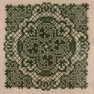 May include: A dark green cross-stitch pattern with a geometric design. The pattern is framed by a square border.