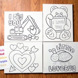 May include: Four blank canvas paintings with outlines of images to color in. The images are a construction vehicle, a teddy bear holding a heart-shaped sign, a heart with concentric circles, and a ladybug. The text on the canvases reads "I Dig You", "I Love You", "Little Lovebug", and numbers 1-5.