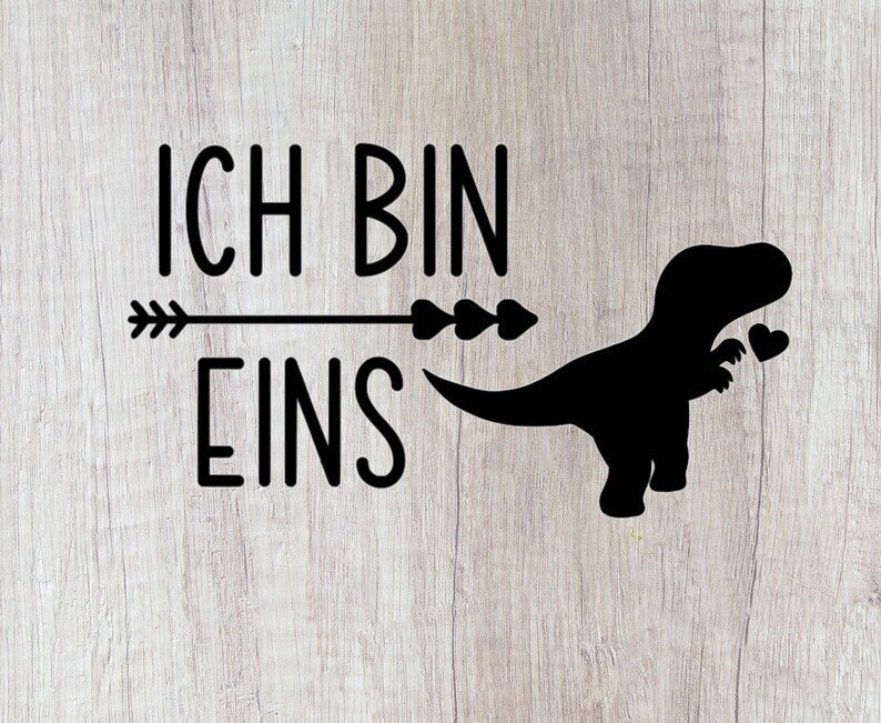 May include: Black and white graphic with the text "ICH BIN EINS" and a silhouette of a dinosaur holding two hearts.