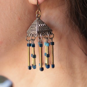 Beautiful earrings in the shape of a triangle cube with silver and gold flowers with blue hematite stones image 1