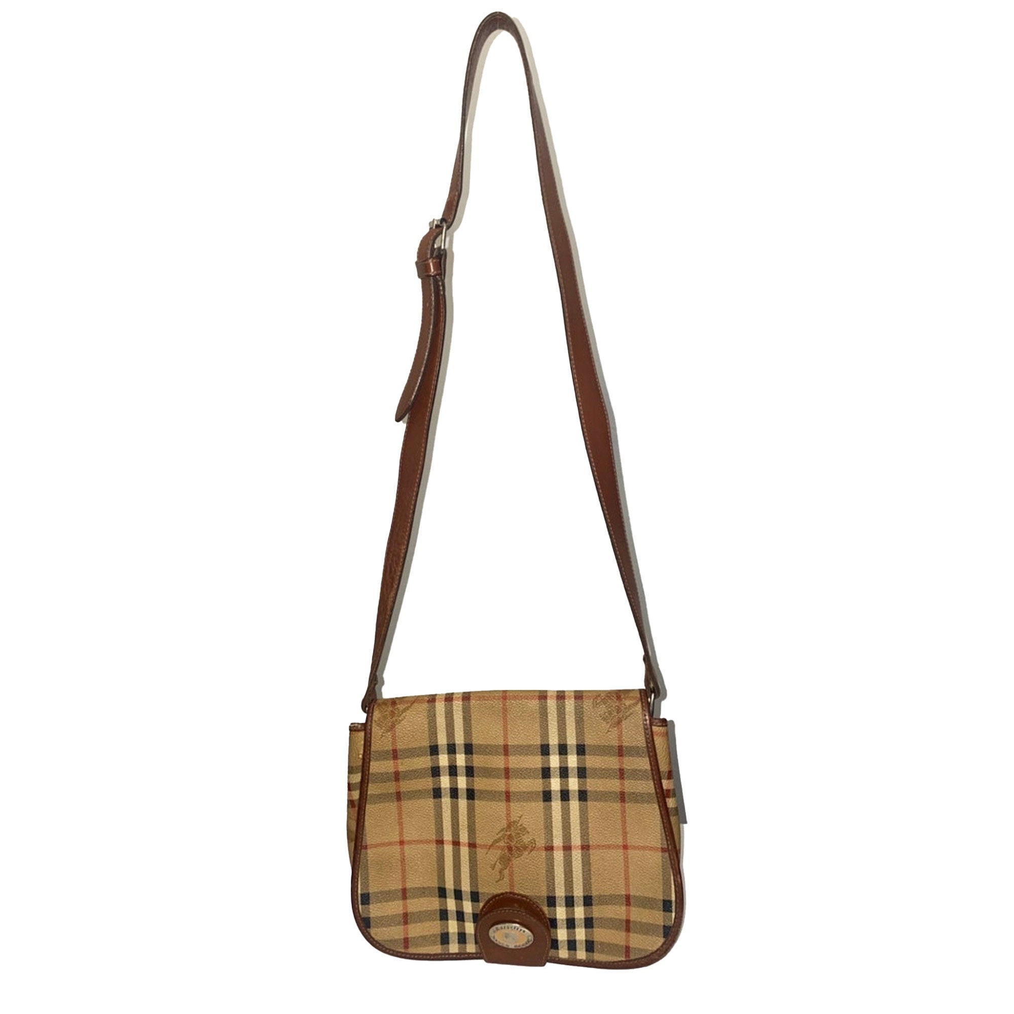 Burberry Nova Check Plaid Small Pochette Bag. Coated canvas signature nova  check body with brown leather trim. Measures - 8.75 x 5.25 x…