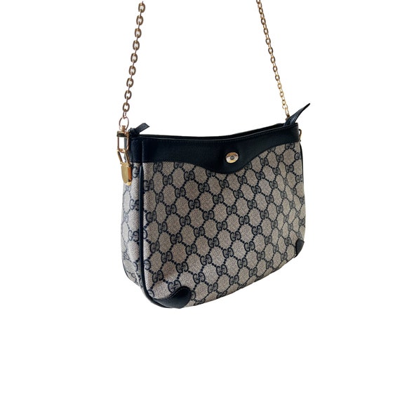 Luxury Vintage Gucci Monogram Bag in Black and Gray Color. 